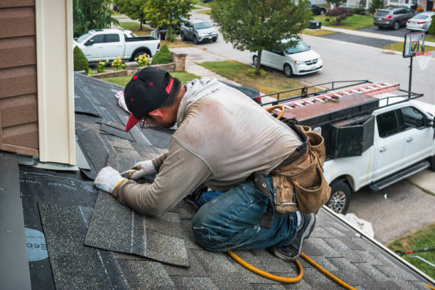 Professional Roofing technician working in Yaphank, NY